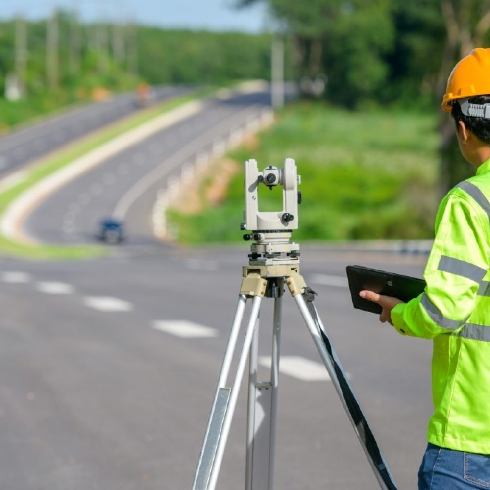 pictures-civil-engineers-doing-survey-work-theodolite-was-used-measure-land-coordinates-standing-outdoor-theodolite-construction-site-road
